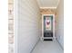 This entryway is cozy with a wreath on the front door and a stone surround at 422 Murphy Avenue, Canton, GA 30114
