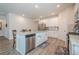 Bright kitchen features a large island, stainless steel appliances, and ample cabinet space at 422 Murphy Avenue, Canton, GA 30114