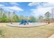 Community playground featuring swings, slides, and various recreational structures on grounds at 422 Murphy Avenue, Canton, GA 30114