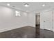 A basement with a visible utility access through a doorway at 1155 Peachtree Battle Nw Ave, Atlanta, GA 30327