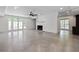 Large basement rec room features a brick fireplace and a patio exit at 1155 Peachtree Battle Nw Ave, Atlanta, GA 30327
