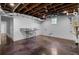 Large basement features an unfinished ceiling with an industrial sink at 1155 Peachtree Battle Nw Ave, Atlanta, GA 30327