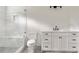 Bright bathroom with white vanity, marble countertops, and a glass-enclosed shower with tile at 1155 Peachtree Battle Nw Ave, Atlanta, GA 30327