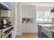 A well-designed kitchen with stainless steel appliances and ample counter space at 1155 Peachtree Battle Nw Ave, Atlanta, GA 30327