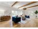 Spacious living room with modern decor, hardwood floors, and ample natural light at 1155 Peachtree Battle Nw Ave, Atlanta, GA 30327