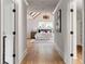 Spacious main bedroom with hardwood floors with entry into ensuite bathroom and walk in closet at 1155 Peachtree Battle Nw Ave, Atlanta, GA 30327