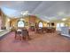 Spacious community room with ample seating, a fireplace, and natural light at 174 Vintage Club Cir, Marietta, GA 30066