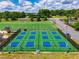 Aerial view of tennis and football field, showcasing the layout and facilities available at 7455 Cordery Rd, Cumming, GA 30040