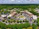 Aerial view of the community showcasing shops, restaurants, and green spaces at 7455 Cordery Rd, Cumming, GA 30040