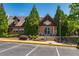 Exterior of the 'Branchwater' community clubhouse with well-maintained landscaping at 7455 Cordery Rd, Cumming, GA 30040