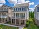 Charming two-story home with a welcoming front porch, great neighborhood, and manicured landscaping at 7455 Cordery Rd, Cumming, GA 30040