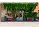 Exterior of 'The Flower Post' shop, draped in lush greenery and floral arrangements at 7455 Cordery Rd, Cumming, GA 30040