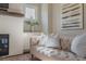 Comfortable living room features a fireplace, built-ins, and neutral décor at 7455 Cordery Rd, Cumming, GA 30040