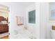 Bright bathroom featuring a tub and natural light from the window, bedroom located next door at 1605 Barrier Rd, Marietta, GA 30066