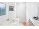 Bright bathroom featuring a tub and natural light from the window at 1605 Barrier Rd, Marietta, GA 30066