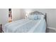Bedroom featuring a comfortable bed with decorative pillows and a view to a fireplace at 1605 Barrier Rd, Marietta, GA 30066