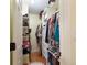 Walk-in closet with custom shelving and plenty of storage space at 1605 Barrier Rd, Marietta, GA 30066