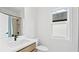 Well-lit bathroom with modern fixtures, a walk-in shower, and a window at 298 Tillman Pass, Woodstock, GA 30188