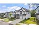 Charming two-story home with a two-car garage, well-maintained lawn, and attractive curb appeal at 298 Tillman Pass, Woodstock, GA 30188