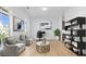 Bright living room featuring hardwood floors, neutral walls, and stylish decor, perfect for relaxing or entertaining guests at 298 Tillman Pass, Woodstock, GA 30188