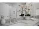 Close up on marble countertop in a bright bathroom with a sink and decor at 3408 Landen Pine Ne Ct, Atlanta, GA 30305