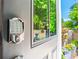 Keypad entry on a painted door with window offering a glimpse of a landscaped entrance at 3408 Landen Pine Ne Ct, Atlanta, GA 30305