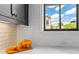 Charming kitchen with subway tile backsplash, marble countertops, and black window frames at 3408 Landen Pine Ne Ct, Atlanta, GA 30305