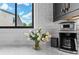 Bright kitchen with white subway tile backsplash, marble countertops, and stainless steel coffee maker at 3408 Landen Pine Ne Ct, Atlanta, GA 30305