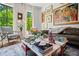 Stylish living room featuring large windows, modern decor, and comfortable seating arrangements at 3408 Landen Pine Ne Ct, Atlanta, GA 30305