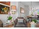 Cozy living room with arm chair, hardwood floors, and artwork at 3408 Landen Pine Ne Ct, Atlanta, GA 30305