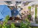 Charming patio with stylish outdoor seating, a vibrant umbrella, and lush landscaping for relaxing outdoor living at 3408 Landen Pine Ne Ct, Atlanta, GA 30305