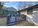 Charming backyard deck for outdoor dining and relaxation featuring a grill and stylish patio furniture at 52 Buena Vista Se Cir, Cartersville, GA 30121