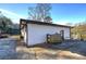 The back exterior showcases a well-maintained brick home with access to the backyard at 52 Buena Vista Se Cir, Cartersville, GA 30121