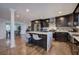 Open kitchen featuring an island with marble countertop and seating for two at 52 Buena Vista Se Cir, Cartersville, GA 30121