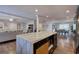 Open-concept kitchen with a kitchen island, stainless steel appliances, and easy access to dining at 52 Buena Vista Se Cir, Cartersville, GA 30121