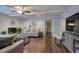 Cozy living room features a fireplace and opens up to a staircase at 52 Buena Vista Se Cir, Cartersville, GA 30121