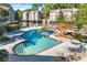 Gorgeous pool with brick accents and lounge chairs, perfect for enjoying sunny days in the community at 610 Mill Pond Se Dr, Smyrna, GA 30082