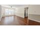 Bright living room with lots of natural light, beautiful floors, and neutral color palette at 610 Mill Pond Se Dr, Smyrna, GA 30082
