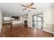 Spacious living room with hardwood floors, fireplace, and slider to the outside deck at 610 Mill Pond Se Dr, Smyrna, GA 30082