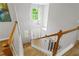 A birds eye view of the foyer featuring hardwood floors and a chandelier at 865 Ashfield Dr, Decatur, GA 30030