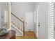 Inviting foyer features hardwood floors, staircase, and a front door with sidelight windows at 865 Ashfield Dr, Decatur, GA 30030