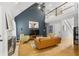 Stylish living room boasting vaulted ceilings, a cozy fireplace, and an open layout perfect for entertaining guests at 865 Ashfield Dr, Decatur, GA 30030