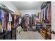 Organized walk-in closet with ample shelving and hanging space for clothing and accessories at 865 Ashfield Dr, Decatur, GA 30030