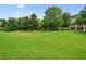 Expansive green space, well-maintained, offering a serene and open environment for residents to enjoy at 2143 Yancey Ne Ln, Atlanta, GA 30319