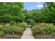 A serene walkway lined with colorful flowers and lush greenery, inviting residents to take a peaceful stroll at 2143 Yancey Ne Ln, Atlanta, GA 30319