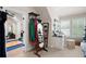 Organized closet space with clothing racks, shoe shelves, and a vanity area at 2239 Tayside Nw Xing, Kennesaw, GA 30152
