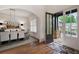 Open door showcasing dining room with hardwood floors and natural light at 2239 Tayside Nw Xing, Kennesaw, GA 30152