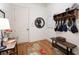 Inviting foyer with hardwood floors, built-in storage, and a charming bench at 2239 Tayside Nw Xing, Kennesaw, GA 30152
