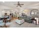 Open concept living space featuring hardwood floors, furniture, with views into the kitchen at 2239 Tayside Nw Xing, Kennesaw, GA 30152