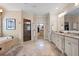 Luxurious main bathroom with soaking tub, walk-in shower, and double vanity at 2239 Tayside Nw Xing, Kennesaw, GA 30152